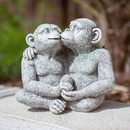 kissing monkeys garden statue