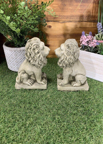 PAIR OF SMALL PROUD LION ORNAMENTS