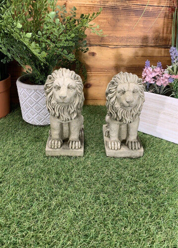 PAIR OF SMALL PROUD LION ORNAMENTS